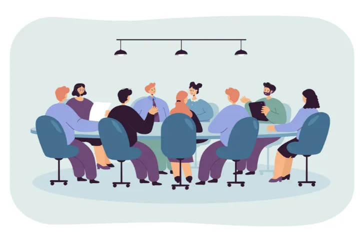 politician-sitting-at-round-table-in-boardroom